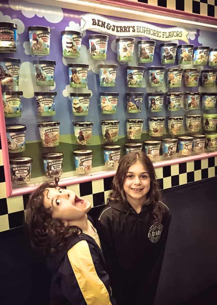 Ben and Jerrys Factory - Kids making faces in front of ice cream wall